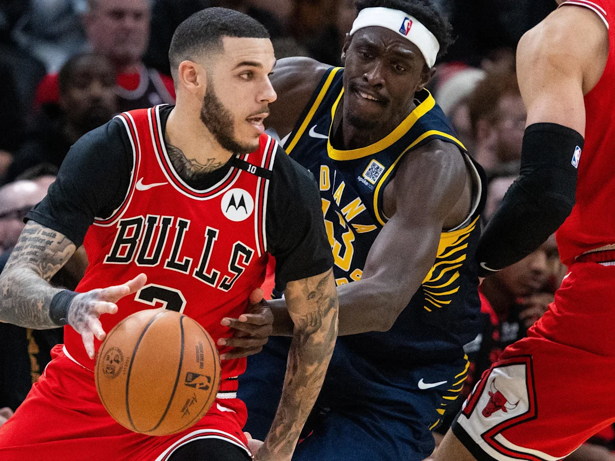 lonzo ball is going to goal by loosing cavs isaac okoro