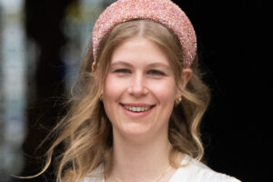 Lady Louise Windsor in lilac floral dress and hat at a 2024 garden party