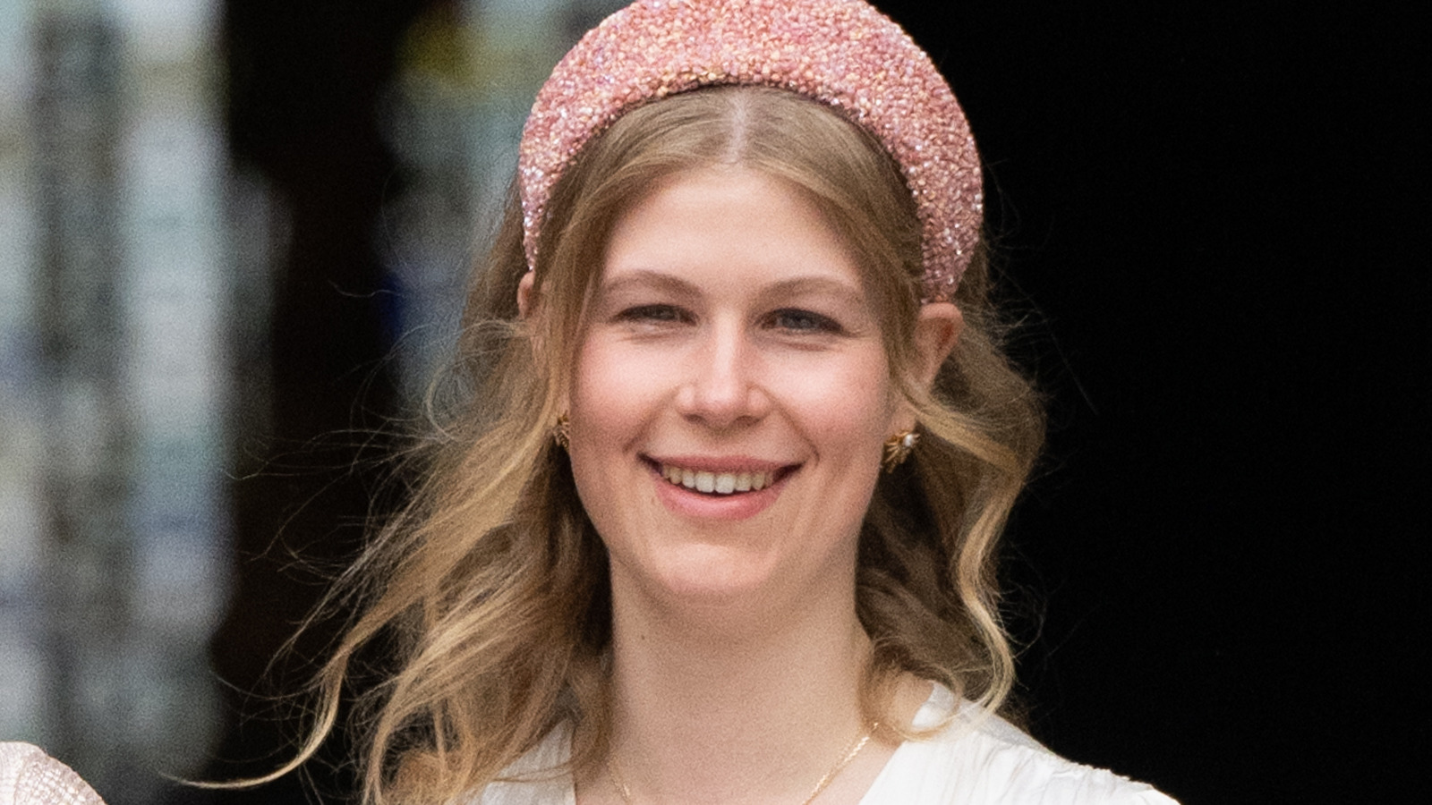 Lady Louise Windsor in lilac floral dress and hat at a 2024 garden party