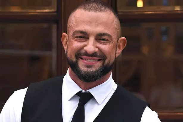 Robin Windsor smiling in dance rehearsal